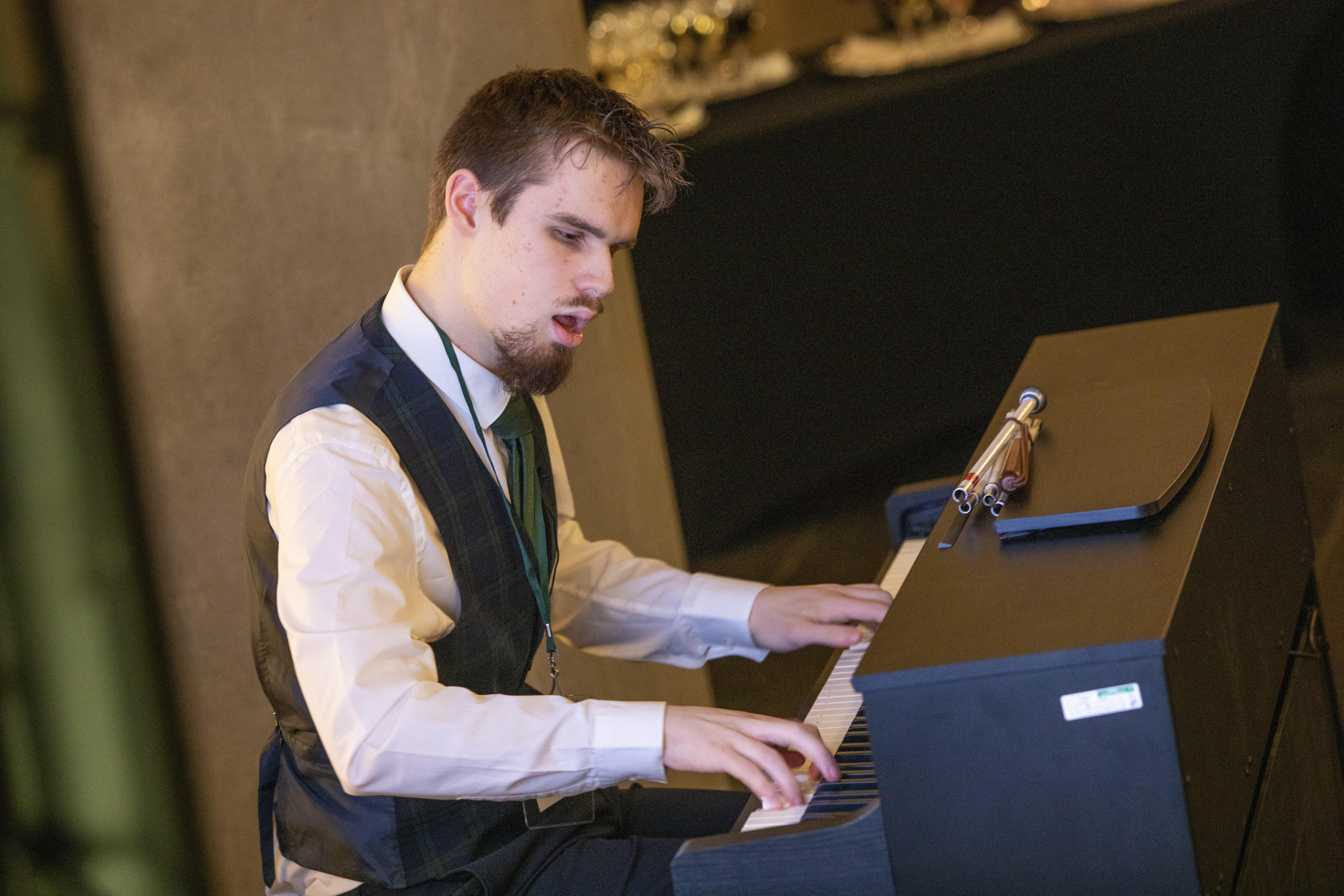 A pianist performs a song at the Scottish Parliament