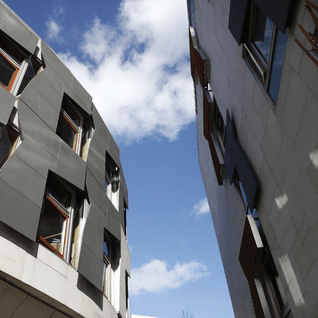 View between Canongate buildings at Holyrood