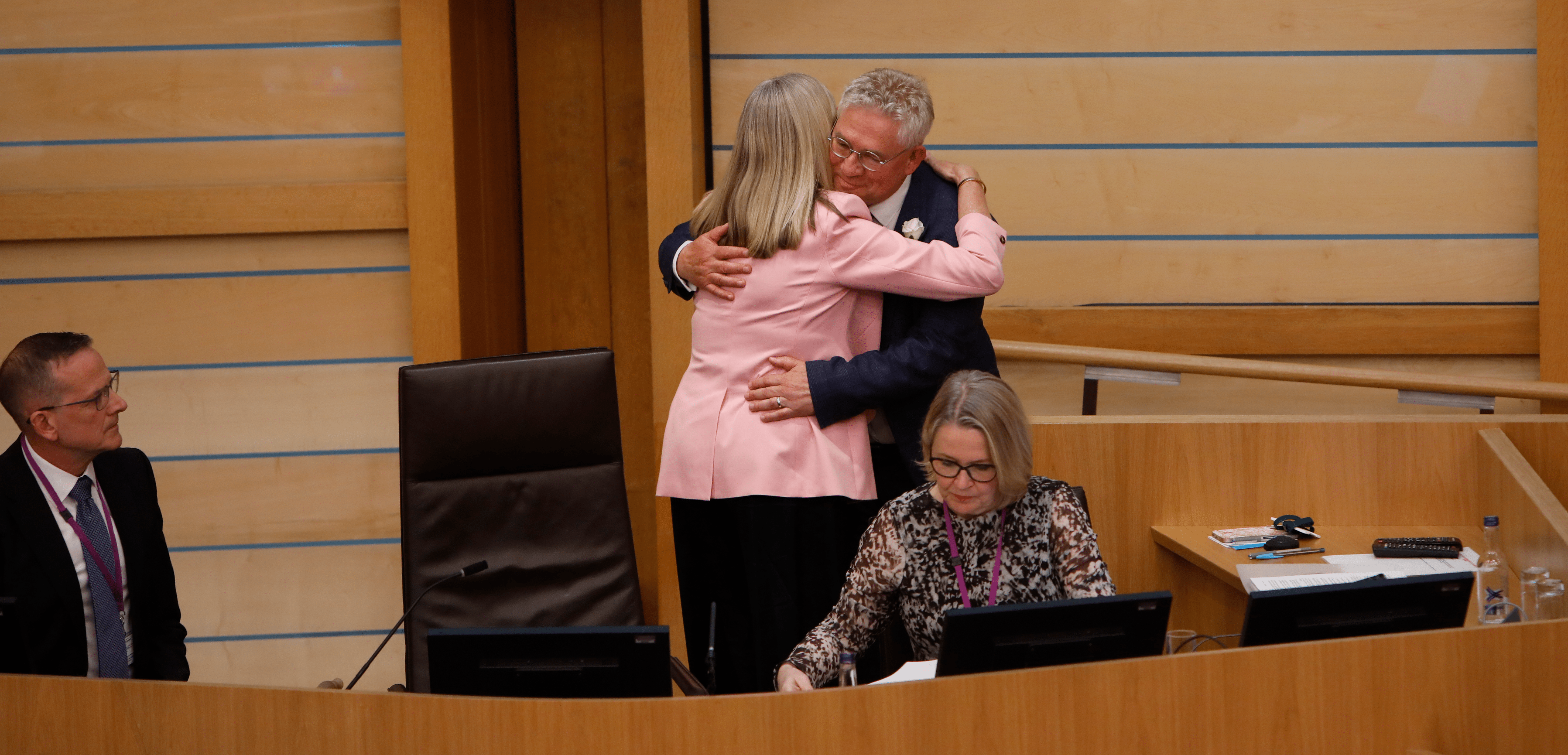 Kenneth Gibson is congratulated by outgoing Presiding Officer Alison Johnstone MSP following his election