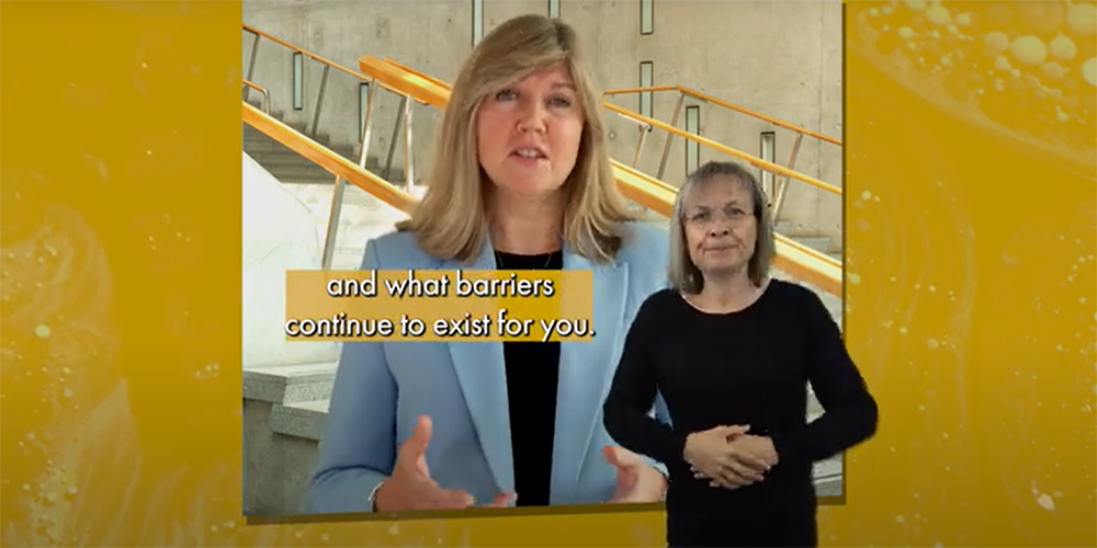 Presiding Officer Alison Johnstone  in the Garden Lobby with a BSL interpreter superimposed 