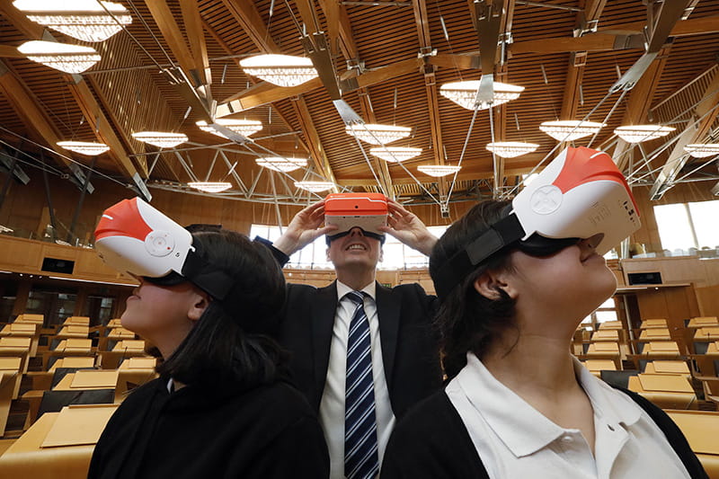 Visitors using VR headsets in the Chamber