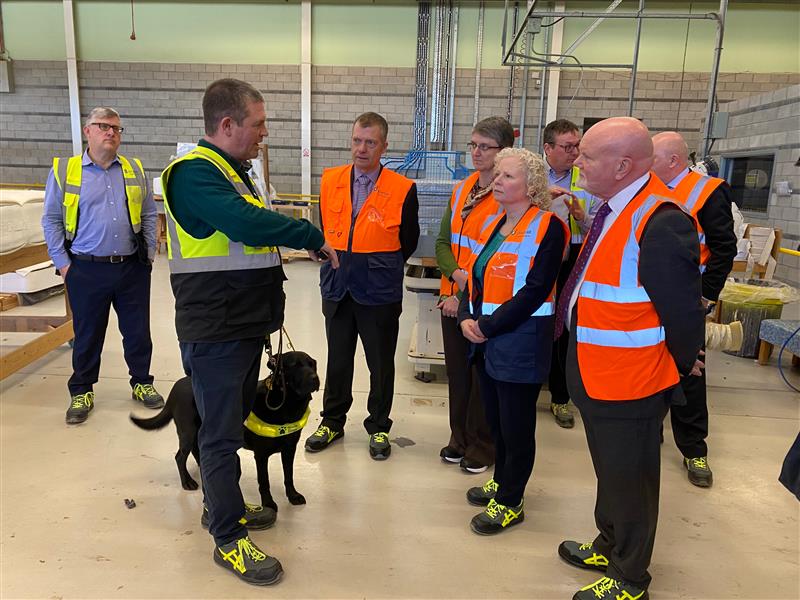 Members of the Committee on a tour of Dovetail factory.
