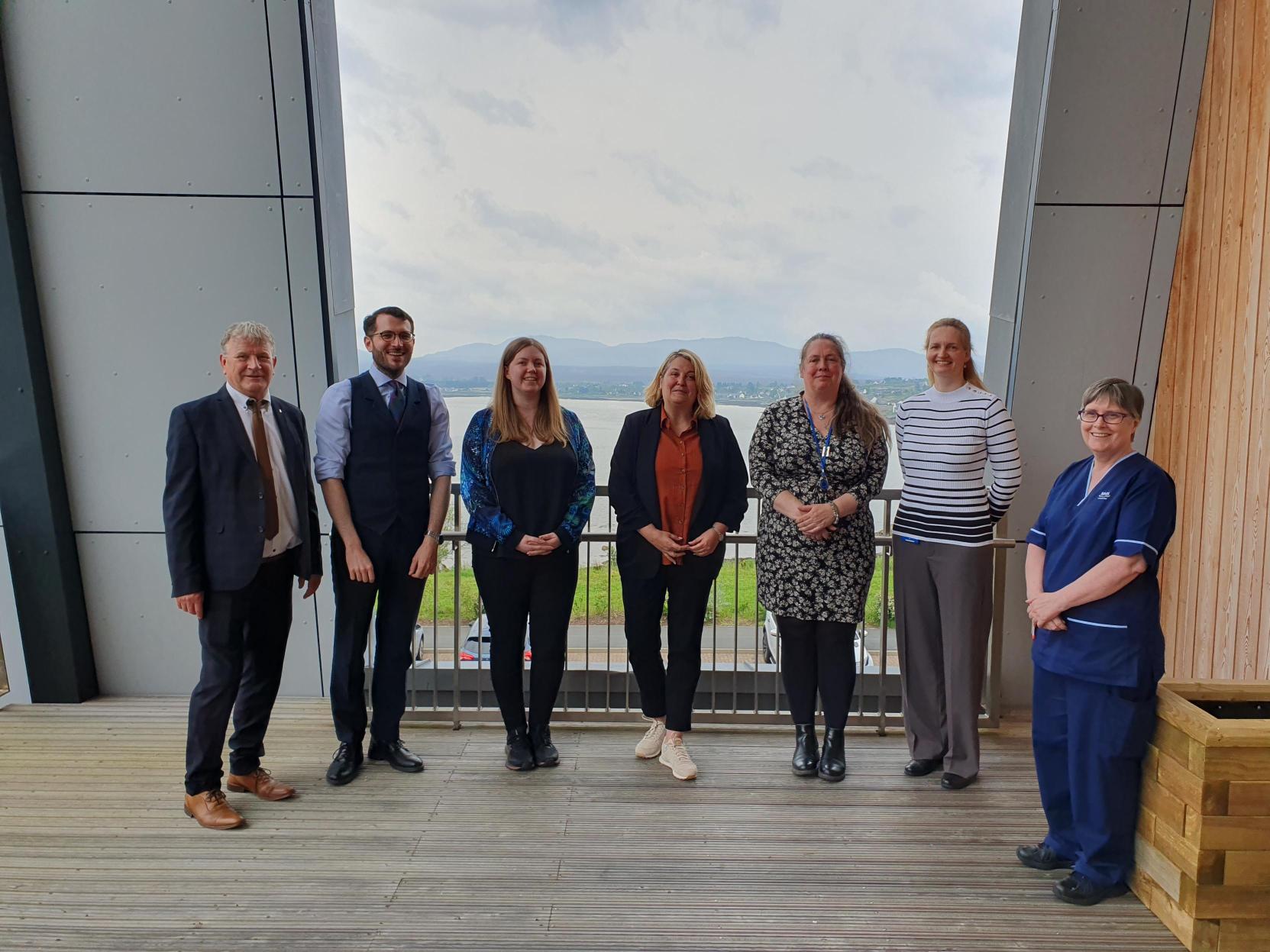 A photograph of Committee Members on an engagement visit to Skye